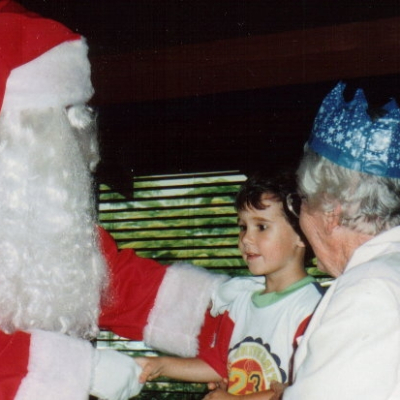 Anne Mein Sam Heinrich with Santa at Xmas Lunch Keg 2