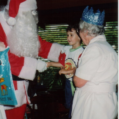 Anne Mein Sam Heinrich with Santa at Xmas Lunch Keg