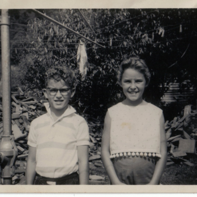 Marg Paul Near Clothes Line and Wood Pile