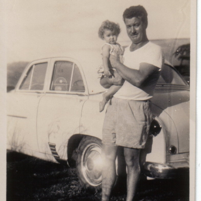 Marg and Friend Near a Car