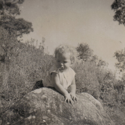 Paul on the Rock Near the House Palm Woods